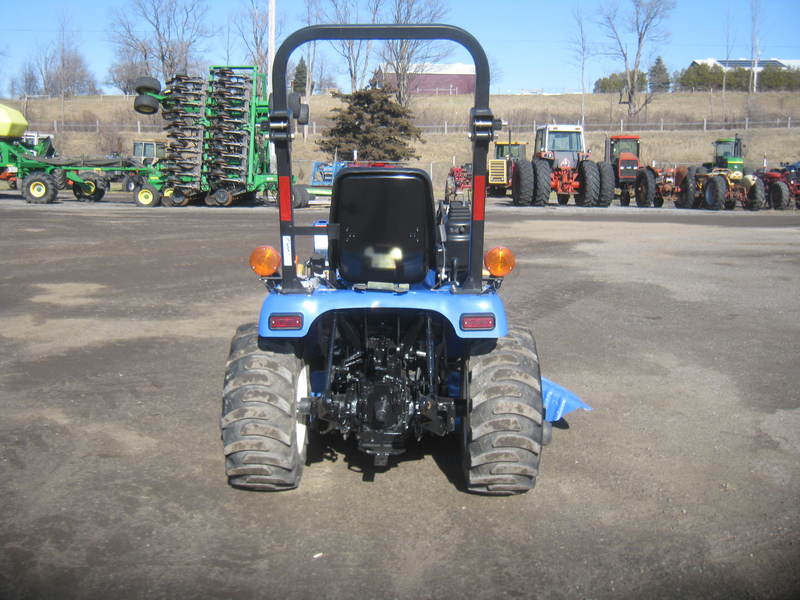 Tractors - Compact  New Holland T1030 Tractor  Photo